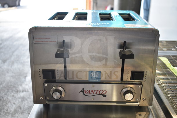 Brand new Avantco countertop 4-slot toaster, 120V, 1 Phase, with minor scratches. Features adjustable knobs and control levers.