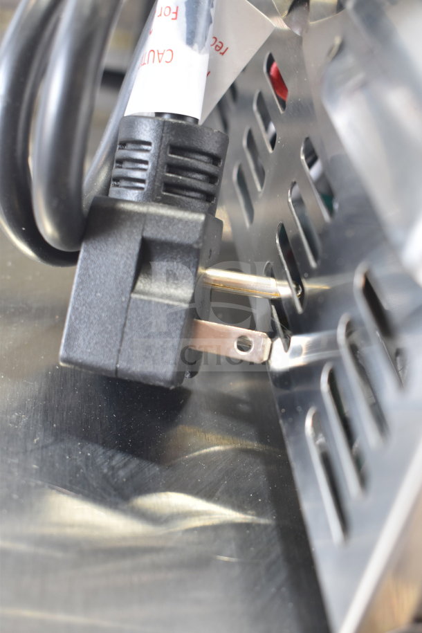 Brand new Avantco 4-slot toaster plug detail. Features 120 volts, 1 phase. Minor scratch and dent condition.