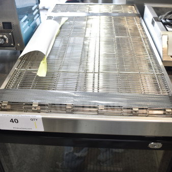 BRAND NEW Cooking Performance Group 35132BELT 32" conveyor belt. Scratch and dent condition. Auction tag visible.