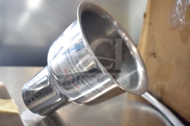 Brand new warming lamp, scratch and dent condition, 120 volts, 1 phase, stainless steel, warning label visible, industrial design.