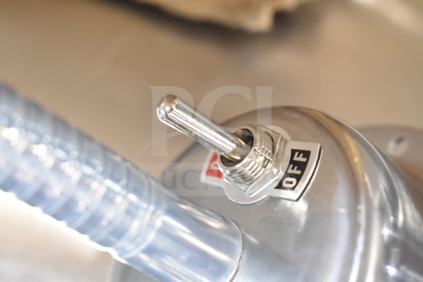 Brand new warming lamp with switch, 120V, 1 phase, minor scratches. On/Off label visible on metallic surface.