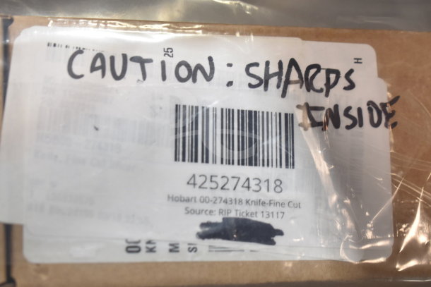 Package labeled "Caution: Sharps Inside" with barcode and text showing "Hobart 00-274318 Knife-Fine Cut."