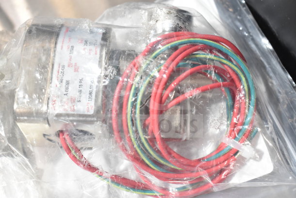 Brand new Henny Penny 17121 Valve Assembly, 120v, in packaging with visible wires and label details. Scratch and dent.