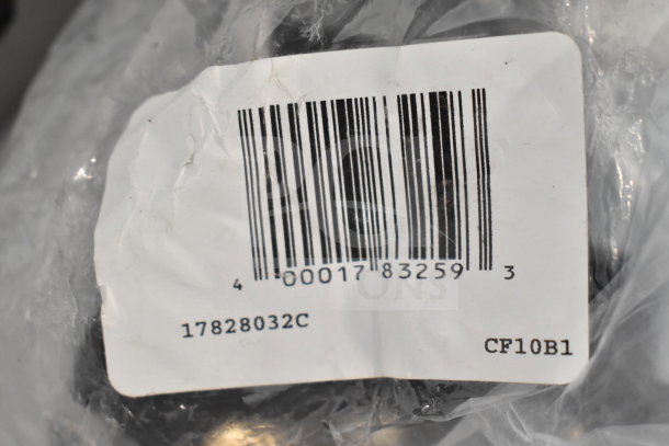 Brand new Avantco 17817638 compressor with scratches and dents. Model 17828032C. Voltage: 115-127V, 1 Phase. Barcode visible.