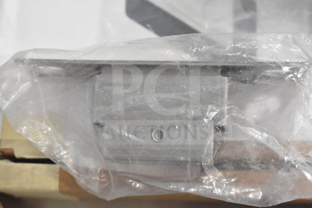 Three brand new items: Metro RPC13-1450 digital thermometer, Moffat M234580 door roller catch, and another component, wrapped in protective plastic.
