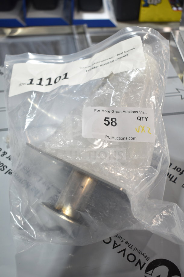 Brand new Vulcan 00-858579-00002 burner head assembly in sealed packaging with visible labels, indicating scratch and dent status.
