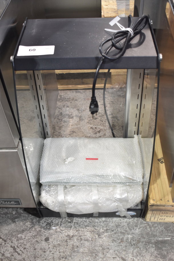BRAND NEW KoolMore DC-3CB Commercial Glass Bakery Display Case, 2.7 cu. ft., with bubble-wrapped components placed inside.