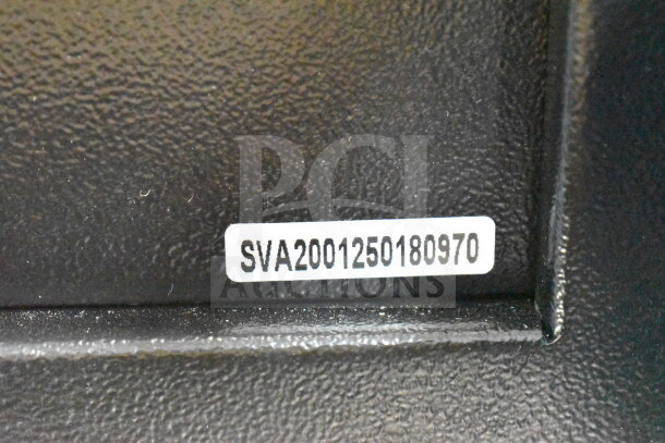 Brand new 360 Office Furniture black steel wall-mount key cabinet safe; electronic keypad, 133-key capacity, minor scratches/dents.
