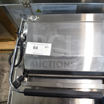 BRAND NEW SCRATCH AND DENT! 2025 Avantco 177PG200GST Commercial Panini Sandwich Grill with Timer, Grooved Top and Smooth Bottom Plates, and 13 3/8" x 8 3/4" Cooking Surface . 120 Volts, 1 Phase. Tested and Working!