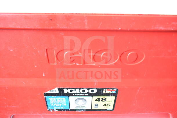 Red Igloo Laguna cooler, 48 quarts, visible lid label, cool rise technology. Includes 2 blue and 1 red cooler.