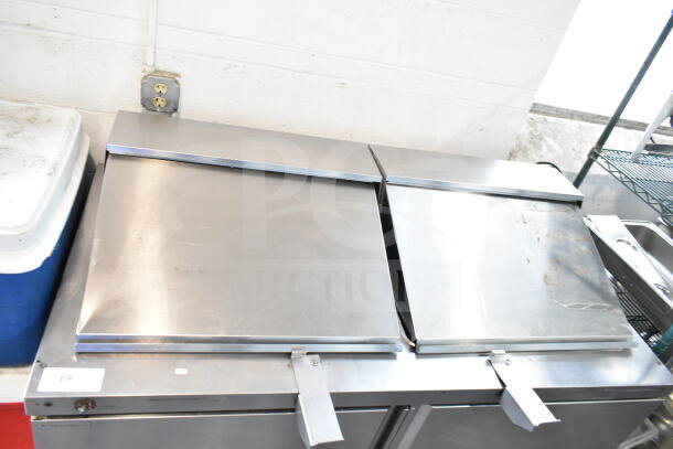 2019 Delfield 4460NP-24M sandwich salad prep table with stainless steel finish. Visible wear, electric, 115V, 1 Phase.