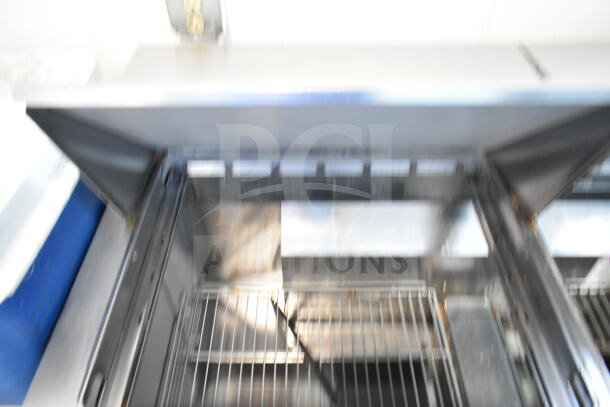 2019 Delfield 4460NP-24M commercial sandwich prep table, stainless steel, 115V, 1 phase, interior view.