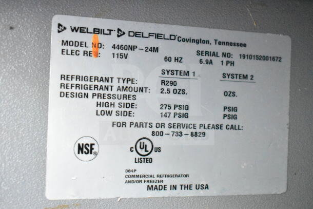 2019 Delfield 4460NP-24M commercial prep table label, 115 volts, NSF certified, refrigerant details, made in USA.