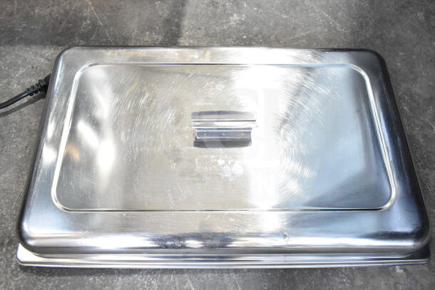 Lot featuring a polished stainless steel chafer lid with handle, in good condition; part of a mixed items collection.