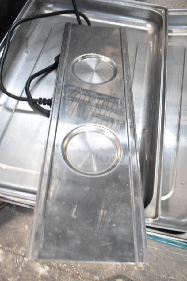 Lot of various items including metal food service trays and chafer lids, showing light wear, ideal for catering use.