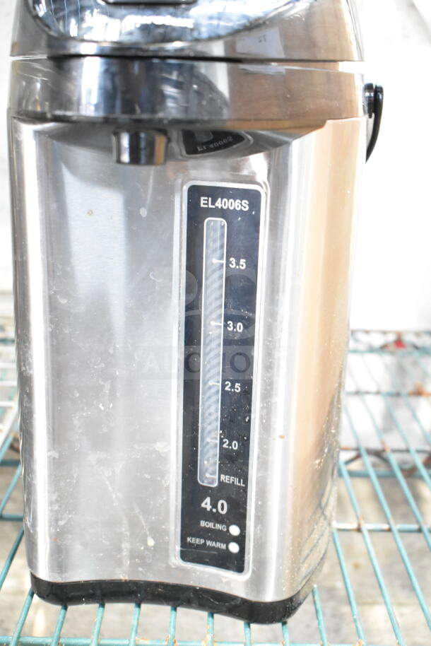 Hamilton Beach beverage holder and Eurolux EL4006S dispenser, good condition, capacity markings visible up to 4 liters.
