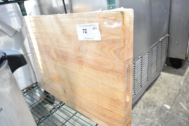 Choice 407WCB2416 wooden cutting board, 24"x16". Natural wood grain, new condition, auction tag with quantity 72 visible.
