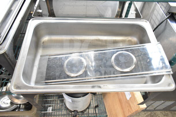 Four stainless steel chafing dishes with lids, used condition, ideal for catering. Auction includes four sets per bid.