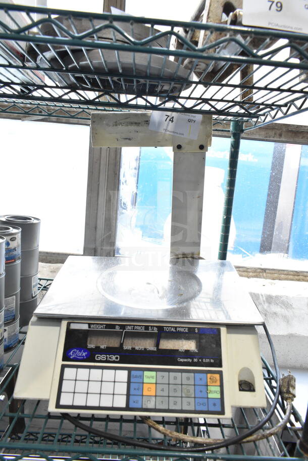 Globe GS130 commercial countertop scale, 30-pound capacity with digital display, used condition, on wire shelf.