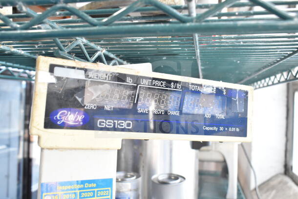 Globe GS130 Commercial Countertop Scale, 30 lb capacity, shows wear. Features digital display and pricing inputs.