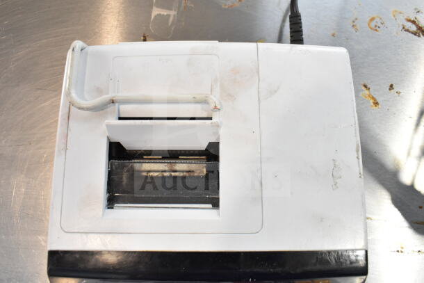 Sharp EL-1197PIII printing calculator, used, shows signs of wear, functional push button, power cord attached.