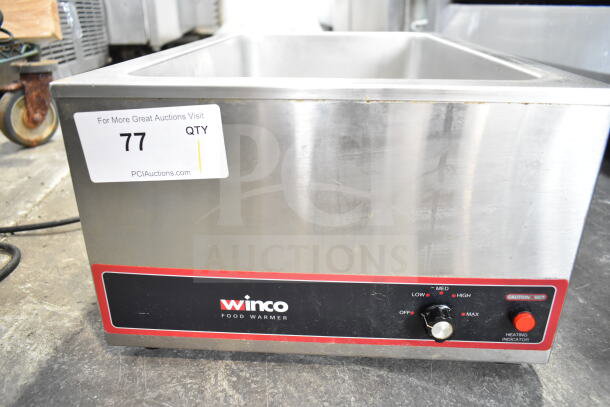 Winco FW-S500 countertop food warmer, 120 volts, 1 phase. Features dial control and heating indicator. Good condition.