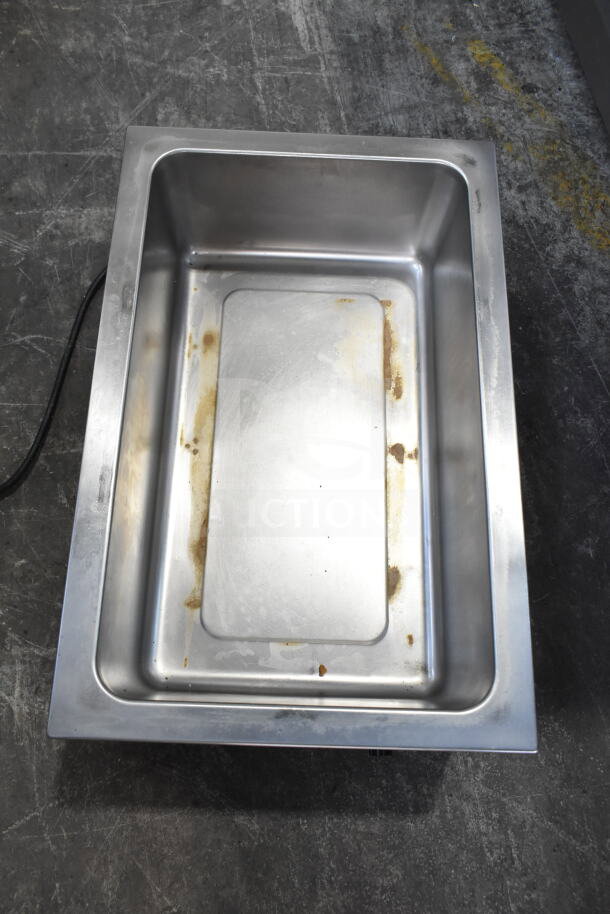 Winco FW-S500 Countertop Food Warmer, stainless steel, visible wear inside, 120 volts, 1 phase, model FW-S500.