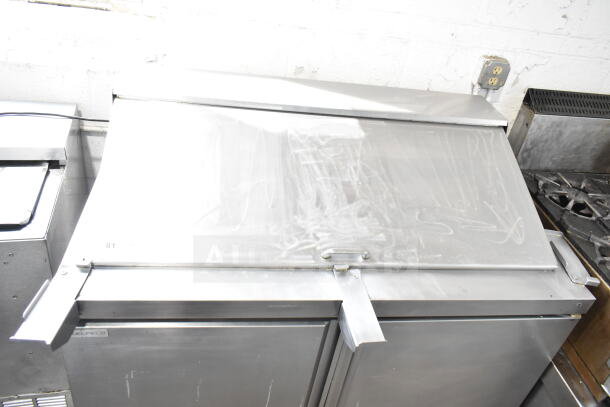 Delfield 4448NP-18M-A5 commercial sandwich salad prep table, stainless steel, mega top, 115V, used condition.