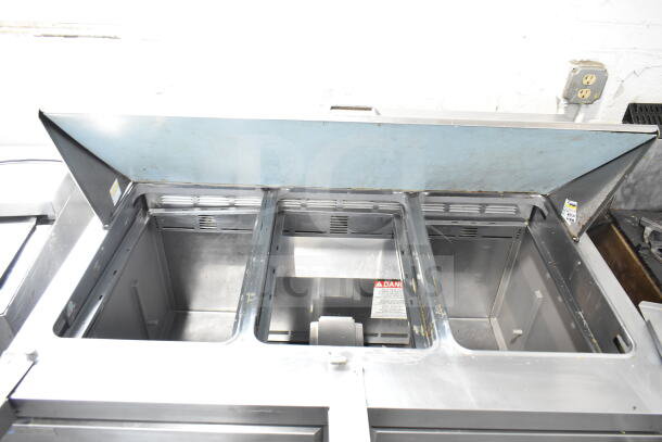 Delfield 4448NP-18M-A5 commercial sandwich salad prep table, bain marie mega top, stainless steel, 115V, 1 phase, used.