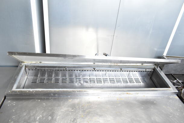 Continental CPA60 Commercial Pizza Prep Table, stainless steel, 115 volts, 1 phase, open top, visible wear, industrial use.