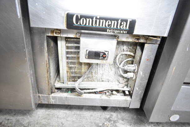 Continental CPA60 Pizza Prep Table, showing refrigeration unit with visible wear, model label clearly displayed.
