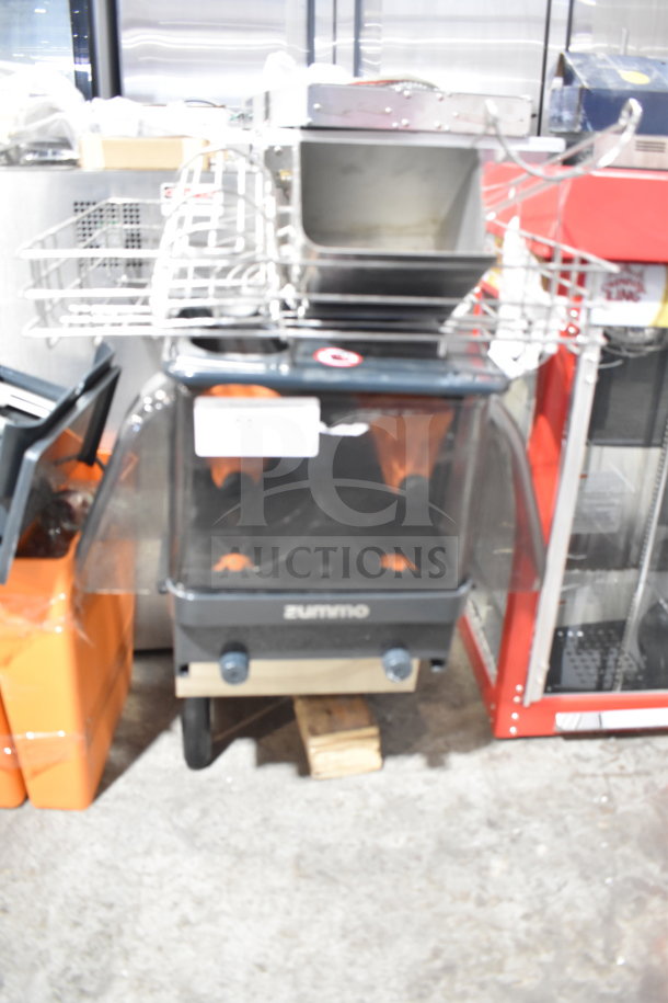 Zummo Z06C-N countertop commercial juicer, model Z06C-N, 100-120 volts, visible label, used condition.