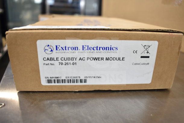 Extron 70-261-01 Cable Cubby AC Power Module in original packaging; includes serial and part numbers on label.