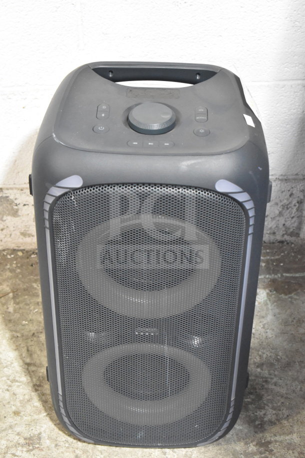 Onn Large Party Speaker, black, with dual drivers, control panel on top, and handle. Used condition, minor surface wear.