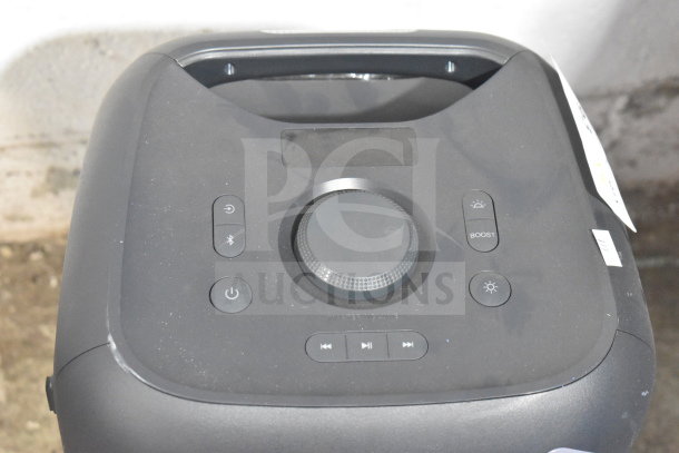 Onn Large Party Speaker with control panel, featuring power, Bluetooth, boost, and light effect buttons. Auction includes four units.