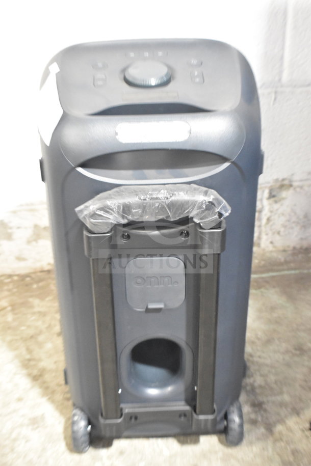 Onn large party speaker, black with wheels, control panel on top, protective plastic cover, store display condition.