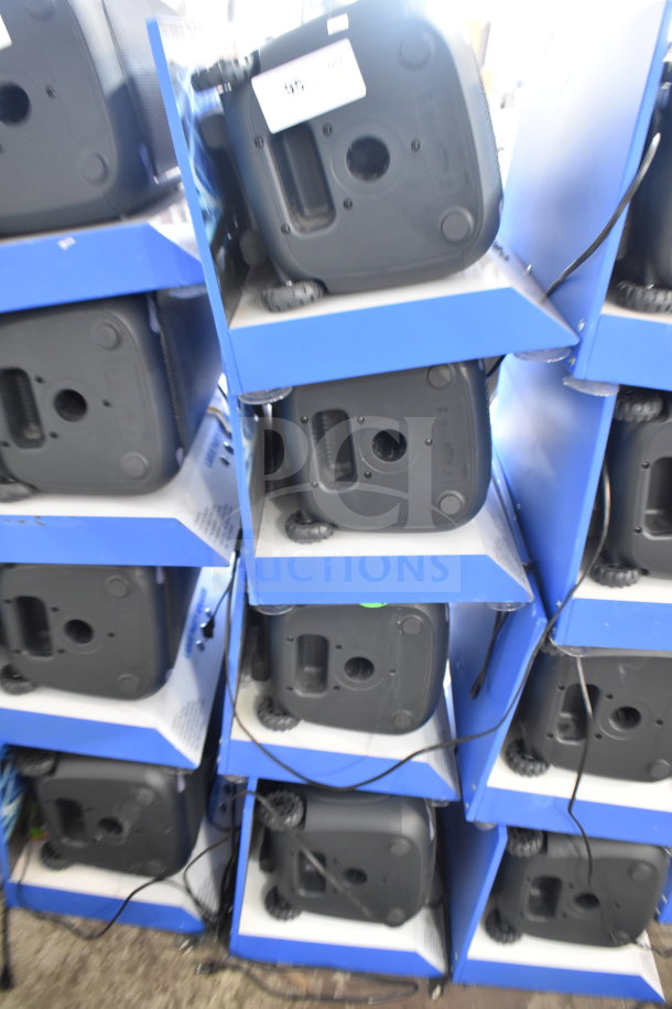 4 Onn large party speakers in blue store display, new condition. Multiple units for bid, visible labels with code.