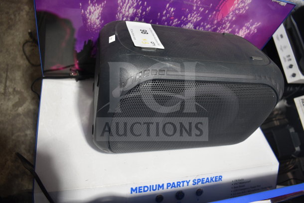 Onn Medium Party Speaker, black, in good condition with visible label "Medium Party Speaker" on base packaging.