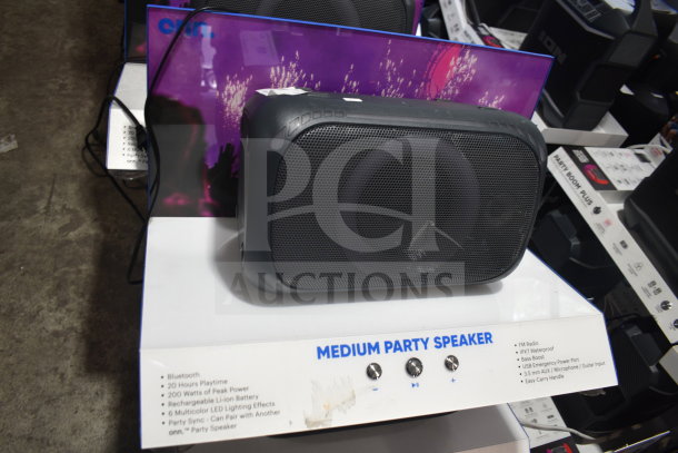 Onn Medium Party Speaker on store display, features include Bluetooth, 200W peak power, LED lighting, and rechargeable battery.