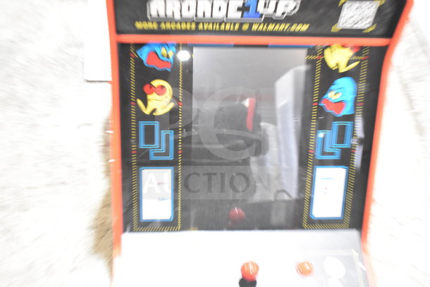 Arcade 1UP PAC-A-501030 Pac Man machine, colorful graphics, intact controls, visible brand and model markings.