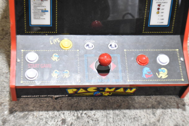 Arcade 1UP PAC-A-501030 Pac Man machine control panel, featuring joystick and buttons, with Pac Man graphics.