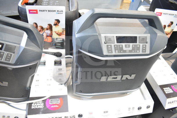 4 Ion Party Boom Plus speakers, Bluetooth connectivity, display model, new condition, includes promotional material.