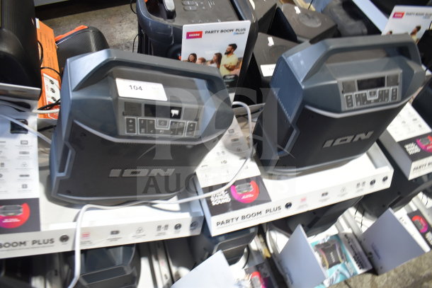 Ion Party Boom Plus speakers on display, set of four. Features include Bluetooth, high-quality sound, and durable build.