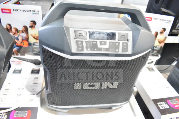 ION Party Boom Plus speaker on store display, featuring Bluetooth connectivity, USB playback, and mic input.