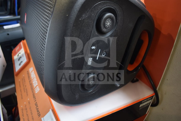JBL Partybox 110 speaker, black, visible control panel, sturdy handle, "Partybox 110" label; excellent condition.