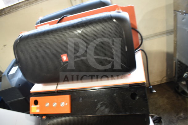 JBL Partybox 110 speaker display set, three units, excellent condition. Features black mesh grille with JBL logo.