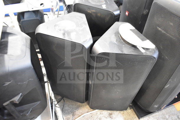Three Samsung MX-ST4CB speakers, black, lightly used condition, visible surface dust. No labels or tags visible.