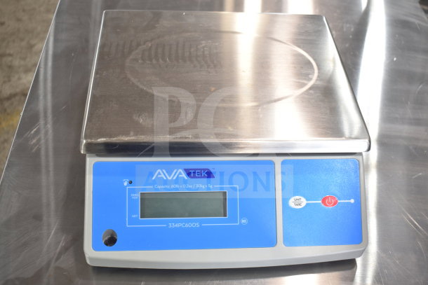 Brand new AvaTek 334PC60OS 60 lb. digital portion control scale, oversized platform, scratch and dent condition.