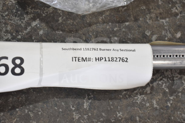 Southbend 1182762 Burner Asy Sectional, brand new with tag displaying item number HP1182762 on industrial surface.