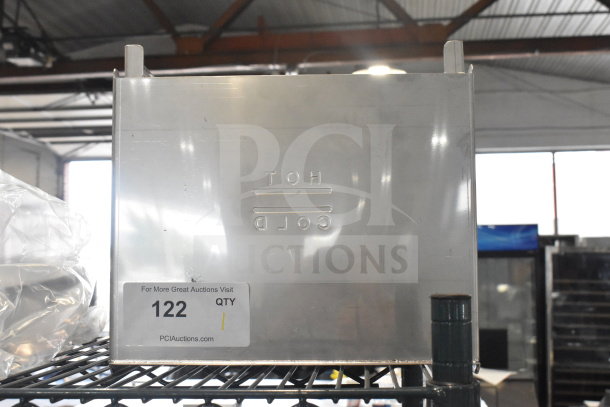 "Brand new scratch and dent cover, metallic finish, labeled 'HOT' and 'COLD', with auction tag '122' from PCIAuctions.com."